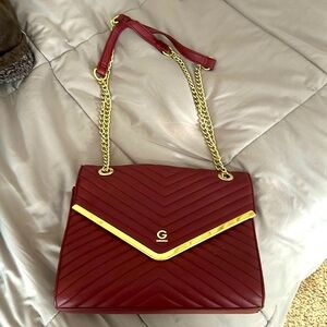 Guess red over the shoulder or cross body purse